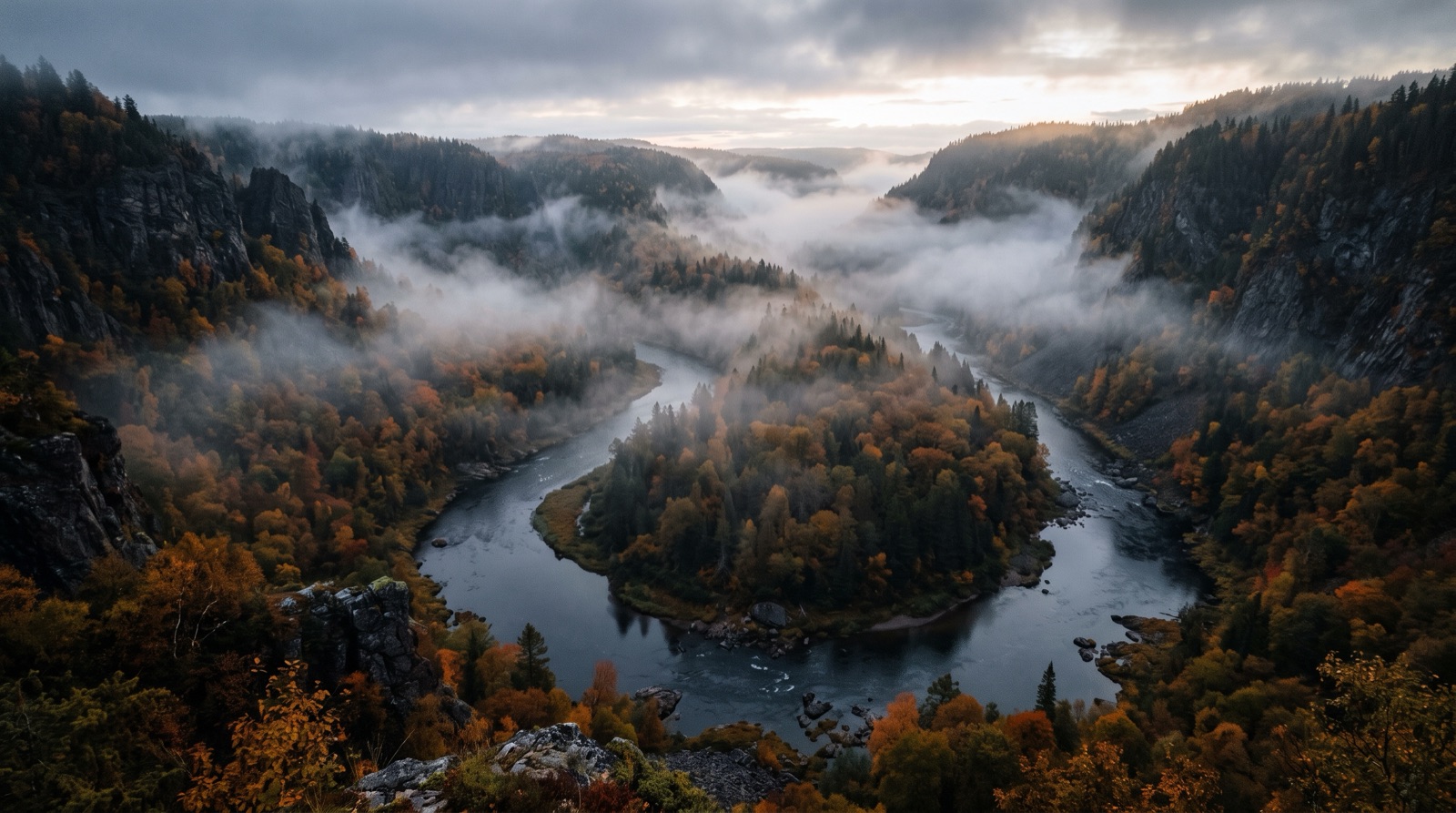 A misty tailwater river winding through a canyon
